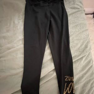 3 pairs of Zumba leggings size large.